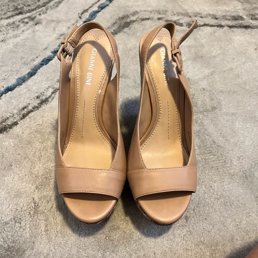 Gianni Bini Tan Wedge. So comfortable!! My foot grew, and they don’t fit. Size7